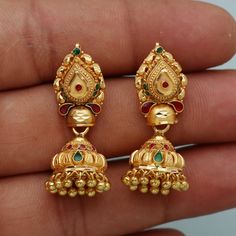 Discover the allure of Handmade Gold Jewelry at https://morvijewels.etsy.com/   Get a dazzling 25% off on all our 22k and 18k gold pieces. Don't miss out on this limited-time offer. Shop now and embrace the radiance of gold!Beautiful 22 Karat Gold Handmade Earrings jhumki Traditional Design jewelry Gold Purity- 22k yellow Gold Length - 3.3 cm approx Width - 1.2 cm approx Weight - 8.26 grams approx The earrings comes with artificial push  If you want real gold push please let us know. Thank You C Meenakari Jhumkas For Marriage And Festivals, Temple Jewelry Peacock Design Jhumkas For Wedding, Gold Bollywood Jhumkas For Marriage, Heavy Chandbali Earrings For Marriage, Wedding Jhumkas With Peacock Design In Temple Jewelry Style, Bollywood Style Gold Jhumkas For Marriage, Meenakari Earrings For Marriage And Festivals, Festive Intricate Design Earrings For Wedding, Festive Temple Jewelry Earrings For Marriage