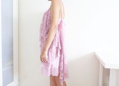 I've been collecting vintage for years, especially slip dresses!! I wanted to repurpose them into something entirely unique and whimsical thus creating a sustainable collection by reducing clothing and textile waste. This creation started as a lovely vintage slip dress in a baby pink and I draped a duskier pink lace over it. I love the 1920s and tried to channel some of this aesthetic into this dress. Measurements: (model is a size UK8/US4) - recommended size, or one more size up. Bust: approx 4 Vintage Slip Dress, Vintage Slip, Slip Dresses, Vintage Slips, Clothing And Textile, Upcycled Vintage, Over It, Pink Lace, Repurpose