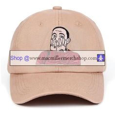 a baseball cap with the image of a man's face on it