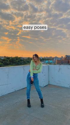 a woman standing on top of a roof with the words easy poses above her head