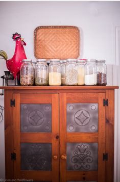 A pie cabinet with 2 quart mason jars filled with dry goods. Bulk Food Storage, Food Storage Rooms, Prepping For Beginners, Recycling Storage, Food Storage Ideas, Homestead Kitchen, Emergency Binder, Used Cabinets, Storage Rooms