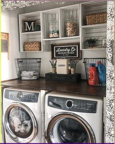 a washer and dryer in a room with open shelves above the washer