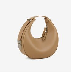 Indulge in timeless elegance with our Genuine Leather Crescent Hobo Handbag. Crafted from high-quality genuine leather, this exquisite handbag features a sleek half-moon design that effortlessly elevates any ensemble. With its attention to detail and superior craftsmanship, it exudes sophistication and refinement. Whether draped over your shoulder or tucked under your arm, this versatile accessory is perfect for both casual outings and special occasions. Make a statement with the understated glamour of our Crescent Hobo Handbag. Main Material: GENUINE LEATHER Lining Material: POLYESTER Interior: Interior Slot Pocket Size: 22 X 6 X 11CM (8.6 x 2.3 x 4.3 inches) Elegant Everyday Baguette Bag With Round Handle, Elegant Baguette Bag With Detachable Strap And Round Handle, Chic Leather Handheld Saddle Bag, Elegant Baguette Bag With Removable Pouch And Round Handle, Elegant Handheld Hobo Bag For Business, Elegant Baguette Bag With Round Handle For Daily Use, Elegant Hobo Bag With Detachable Strap And Round Handle, Elegant Leather Saddle Bag With Smooth Grain, Elegant Evening Hobo Bag With Smooth Grain