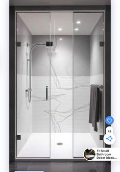 an image of a bathroom with glass shower doors