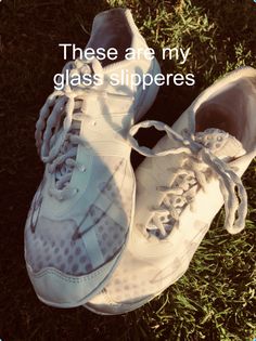 there are two white shoes on the grass with words above them that read, these are my glass slippers