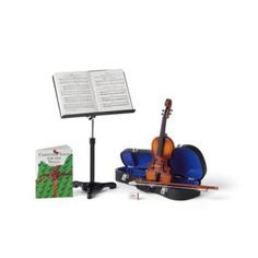 a violin and music stand with sheet music