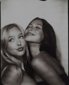 two beautiful young women posing for a photo in front of a white background with the words,