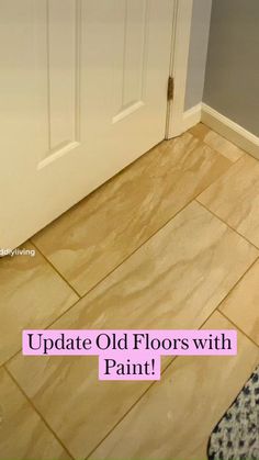 a bathroom with tile flooring and white door in the background that says update old floors with paint