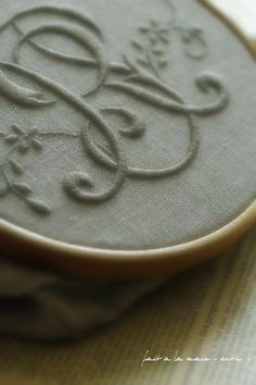 an embroidered object on top of a table