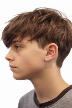 The angular fringe is an up-to-date and fashionable haircut that brings a twist to your appearance. With a mid fade on the sides, it emphasizes the fringe making it the focal point of attention. Click here to check out more trendiest boys haircuts for school.