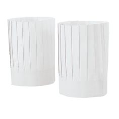 two white vases sitting next to each other on a white surface with lines drawn across them