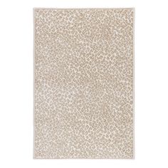 a beige and white rug with an animal print pattern