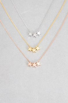 Brushed star charm necklace for a whimsical touch. Available in gold, rose gold, and silver * Lobster clasp * Plated brass * Sliding charms Measurements: * Length: 16.5 in. / 41.91 cm. * Pendant: .5 in. / 1.27 cm. * Extension: 2 in. / 5.08 cm. 2020 Clothes, Heart Shaped Diamond Pendant, Pave Heart Necklace, J Necklace, Real Diamond Necklace, Bff Jewelry, Jewellery Trends, Diamond Bar Necklace, Cube Necklace