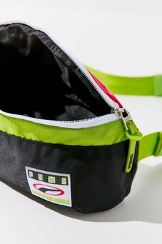 Perfect for giving your off-the-clock looks an instant does of street style, this PUMA fanny pack stands out from the crowded field of belt bags with sporty and vibrant colorblocking. DETAILS Fabric: Technical weave Rubber zip tassels Logo patch Zip at top Lined Weight: 5oz / 0.14kg Imported Measurements Height: 4.25in / 11cm Length: 13.5in / 34cm Depth: 3.5in / 9cm Belt length: 26.75-42.25in / 68-107cm Functional Multicolor Bags For Streetwear, Sporty Belt Bag With Zipper For Sports, Sporty Nylon Belt Bag For Streetwear, Sporty Belt Bag With Removable Pouch For Outdoor Activities, Sporty Belt Bag For Travel, Sporty Black Belt Bag For Outdoor Activities, Sporty Belt Bag For Everyday Use, Sporty Crossbody Belt Bag With Cell Phone Pocket, Casual Crossbody Belt Bag For Sports