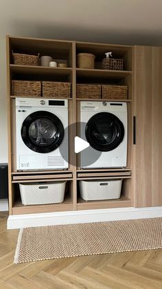 a washer and dryer in a room with wooden shelves on either side of them