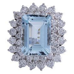 Stamped: 14K White Gold Total Ring Weight: 8.4 Grams Total Natural Aquamarine Weight is 6.92 Carat (Measures: 14.00x10.00 mm) Color: Blue Total Natural Diamond Weight is 2.25 Carat Color: F-G, Clarity: VS2-SI1 Face Measures: 23.70x20.75 mm Sku: [702425W] Sapphire Cocktail Ring, 14k White Gold Diamond Ring, Diamond Cocktail Rings, Gold Diamond Ring, White Gold Diamond Rings, La Face, Aquamarine Stone, 14k White Gold Ring, Natural Aquamarine