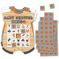 an orange and black baby shower game with basketballs on the front, two matching bibs