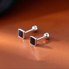 Surgical Steel Small Black Square Ear Stud Earrings Womens Girls Trendy Jewelry | eBay Trendy Black Earrings For Gift, Black Minimalist Metal Cartilage Earrings, Black Minimalist Sterling Silver Cartilage Earrings, Classic Black Single Earring, Adjustable Black Metal Cartilage Earrings, Black Minimalist Plug Earrings, Trendy Black Nickel-free Earrings, Trendy Black Metal Cartilage Earrings, Adjustable Black Sterling Silver Cartilage Earrings