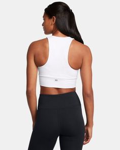 Soft, lightweight performance cotton fabric delivers incredible comfort|Deep V neckline|Ribbed bottom band Fitted Cotton Sports Bra With Seamless Construction, Fitted Cotton Sports Bra With Light Support, Fitted White Cotton Sports Bra, Yoga Sports Bra With Contoured Waistband, White Tops With Built-in Padding, Fitted Under Armour Gym Tops, Cotton Seamless Activewear With Medium Support, White Fitted V-neck Activewear, Fitted White V-neck Activewear