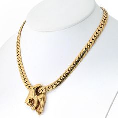 Engage with the essence of sophistication, where style meets substance in the Cartier 18K Yellow Gold Panthère Necklace. This masterpiece of vintage allure and timeless elegance dates back to the late 1970s and early 1980s, encapsulating the bold yet refined spirit that defines Cartier's legendary craftsmanship. Each link of the curb chain glimmers with the rich warmth of 18K yellow gold, offering a luxurious embrace around the neckline. Weighing an impressive 91 grams, this piece is as substant Luxury Timeless Cartier Necklaces, Vintage Cartier Jewelry For Evening, Cartier Fine Gold Necklace, Cartier Gold Fine Jewelry Necklace, Gold Cartier Fine Jewelry Necklace, Gold Cartier Fine Jewelry Necklaces, Timeless Gold Cartier Necklace, Cartier Gold Jewelry For Evening, Timeless Cartier Yellow Gold Necklace