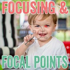 a young boy holding a magnifying glass with focus on focal points in front of him