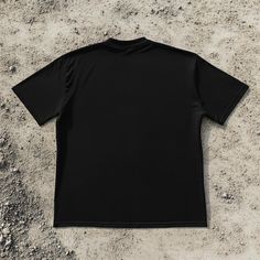 Basic Black T-shirt For Streetwear, Basic Black Pre-shrunk T-shirt, Black Short Sleeve Tops With Back Print, Black Short Sleeve T-shirt For Streetwear, Sporty Black T-shirt With Screen Print, Black Pre-shrunk Tops For Streetwear, Black Shirt With Back Print, Relaxed Fit, Black Graphic Tee With Back Print, Solid Color Screen Print T-shirt With Short Sleeves