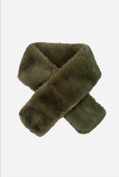 Khaki Short Tuck Through Faux Fur. A beautiful super soft black short pile, this faux fur is the softest faux fur imaginable. This classic faux fur scarf is a must for your wardrobe, perfect for the cold weather. Khaki. One Size. 92cm x 11cm Solid Faux Fur Coat For Cold Weather, Solid Color Faux Fur Coat For Cold Weather, Faux Fur Coat For Cold Weather, Faux Fur Scarf, Collar Scarf, Faux Fur Wrap, Faux Fur Scarves, Fur Wrap, Cashmere Gloves