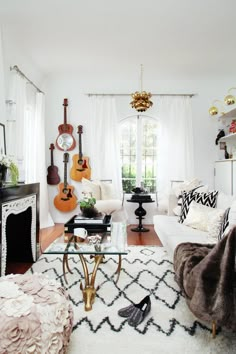 a living room filled with furniture and decor