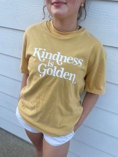 Kindness is Golden T-Shirt. It's printed on the comfiest Comfort Colors tee, with the perfect vintage look. True to size or size up to rock the oversized look. You can select the size and shirt color and we will make this shirt just for you. Please allow 2-3 weeks for your order to ship out. Gold Shirt, Oversized Look, Comfort Colors Tee, Vintage Look, Shirt Color, 3 Weeks, Vintage Looks, Comfort Colors, Cool T Shirts