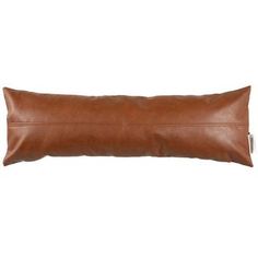 a brown leather pillow on a white background