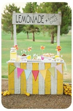 the lemonade stand is decorated with colorful candies