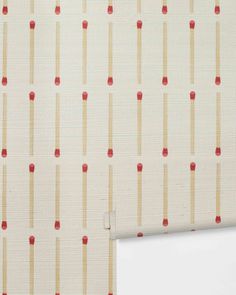 a white wall with red and beige stripes on it