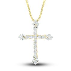 This classic cross necklace is a beautiful display of your faith. Set in timeless 10K yellow gold, brilliant round- and baguette-cut diamonds sparkle in each direction for a total diamond weight of 1/6 carat. The pendant hangs from an 18-inch box chain and secures with a spring ring clasp. Diamond Cross Necklace, Necklace Clasps, Kay Jewelers, Baguette Cut Diamond, Diamond Cross, Baguette Cut, Accessories Jewelry Necklace, Precious Jewelry, Chain Ring