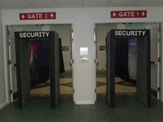 two open doors with security signs on them