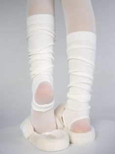 Inspired by classic ballet aesthetics, these leg warmers add a touch of grace and sophistication to any outfit, whether you're in the studio or on the streets. Choose from four beautiful colors to match your personal style and mood. Featuring a stirrup design, these leg warmers stay securely in place. Fitted White Balletcore Bottoms, Spring Balletcore Stretch Bottoms, Fitted Footless Legwear For Barre, Footless Winter Leg Warmers, High Stretch Solid Legwear For Spring, Flexible Footless Winter Leg Warmers, Footless Ballet Bottoms For Dance, Ballet Dance Bottoms Footless, Fitted Knee-high Footless Socks For Spring