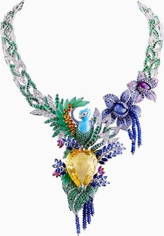 One-of-a-kind Van Cleef & Arpels “Splendeur Africaine” necklace featuring a 82.68-carat pear-shaped yellow sapphire, multi-color sapphires, emeralds, diamonds, chrysoprase and turquoise set in 18K white gold! Gorgeous Jewelry, Yellow Sapphire, Stunning Jewellery