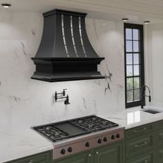 a stove top oven sitting inside of a kitchen next to green cabinets and counter tops