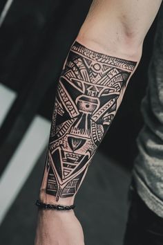 Forearm tattoo featuring intricate, geometric tribal designs. African Symbolism, African Tattoo Ideas, Drum Tattoo, African Tattoo, Powerful Symbols, African Drum, Ancient Egyptian Symbols, African Theme, Warrior Tattoos