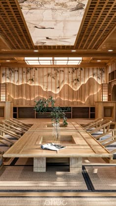 a large wooden table with chairs around it in a room that has wood paneling on the walls