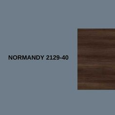 a wooden table with the words normandy 2230 - 40 on it and an image