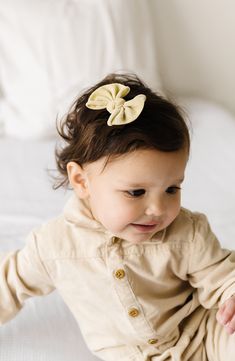 Add a spritz of glam to your little one's 'do with this handy two-pack featuring a bow-adorned headband and hair clip splashed with glitter. 3" width, 2 1/2" height Includes one hair clip and one headband 68% nylon, 16% spandex, 16% silk Made in the USA of imported fabric Bow Headbands, Baby Bling, Baby Bow Headband, Baby Bow, One Hair, Baby Bows, Bow Headband, Metallic Gold, Baby Shop