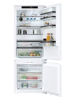 “The Siemens iQ500 Built-in XXL Fridge-Freezer with noFrost Freezer at Bottom combines maximum volume with design quality. The bright interior with transparent materials and generous lighting provides clarity, while metal applications, improved bottle storage with the metal bottle cooler shelf and adjustable shelves combine aesthetics and functionality,” the jury members agreed. With 45 per cent more volume, the model offers space for storing large product quantities. Cool Shelves, Bright Interior, Metal Bottle, Metal Bottles, Bottle Storage, Smart Storage, Fridge Freezers