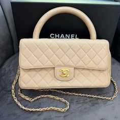 An Extremely Rare Find!! Vintage Chanel Kelly Parent Single Flap Bag Beige Diamond Quilted Lambskin 24k Gold Hardware And Turn Lock Cc Close $4950 Resale This Vintage Kelly Parent Flap Bag Is In Beige Matelasse Quilted Soft Lambskin Leather With 24 Karat Gold Hardware, Featuring The Signature Cc Turnlock Closures With Front Flap, Half Moon Back Pocket And A Black Rolled Top Handle. The Interior Is Lined In Beige Leather And Includes One Zip Pocket With Logo Pull And A Slip Pocket Underneath On T Chanel Kelly, Vintage Kelly, 2024 Vision, Chanel Bags, Diamond Quilt, Vintage Chanel, Vintage Bags, Flap Bag, Lambskin Leather