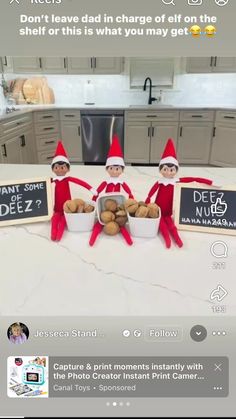 three elfs sitting on top of a kitchen counter with food in front of them