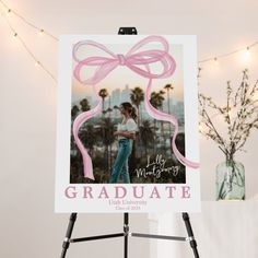 an easel with a graduation card on it