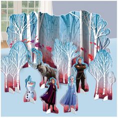 paper cutouts of frozen princesses and snowmen in the woods