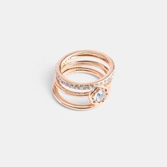 This set of stackable rings add a touch of sparkle to any look. It includes one polished band one pavé band and a Tea Rose bezel-set crystal ring. Wear together or separately. | Coach Halo Tea Rose Ring Set - Women's Size 7 - Rose Gold Pave Band, Rose Ring, Tea Rose, Crystal Ring, Tea Roses, Crystal Rings, Stackable Rings, Women Accessories Jewelry, Womens Jewelry Rings