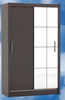 a brown and white closet with glass doors on the door is against a blue sky