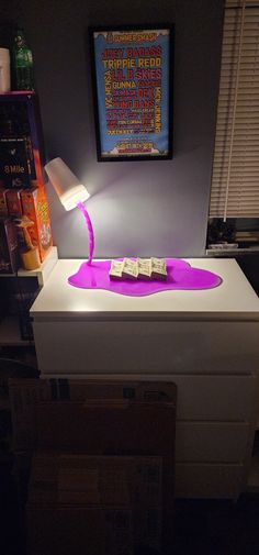 a desk with a lamp on top of it