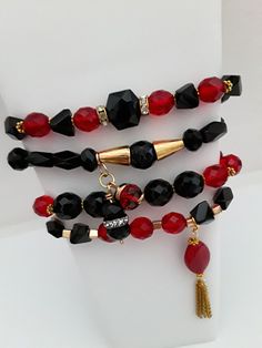 This handmade glass bead fashionable stretch stackable bracelet set is explicitly designed for women with small-size wrists.  Fits wrist sizes approx 6 3/4 inches to 7 inches  This beautiful 4- piece handmade stretch glass bead stack bracelet set was created with gorgeous faceted beads in breathtaking shades of red and black that sparkle, glisten and shine.  Wear this bracelet set to dress up any outfit, you can wear the bracelets stacked or separately, either way, these are standout and speak volumes of beauty. These beautiful stretch bracelets are all handmade with integrity and the best quality materials for that high-end look and appeal for an affordable price.  Beauty does not have to be expensive. Your bracelet arrives in a Jewelry box with a gift tag ready for gifting Pink Heart Gif Unique Gift Card Holder, Bracelets Stacked, Pineapple Jewelry, Unique Gift Cards, Angel Bracelet, Stack Bracelet, Heart Gif, Christian Gifts For Women, Fancy Gifts